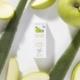 Déodorant solide certifié bio TOOFRUIT à l'odeur de pomme et d'aloe vera pour enfant entouré de fruits